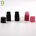 empty cosmetic round pink black colored plastic lip balm tube